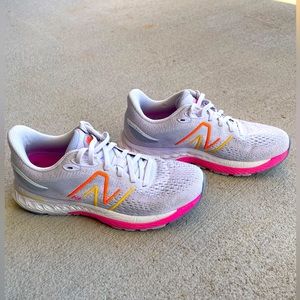 White and Pink New Balance 880. Size 6.5 women’s. Slightly worn.